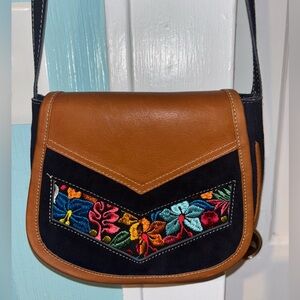Leather and velvet purse
